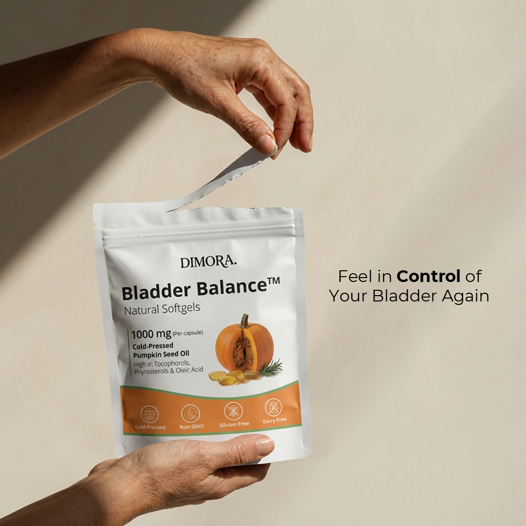 Hand holding a package of Dimora Bladder Balance supplement with a beige background